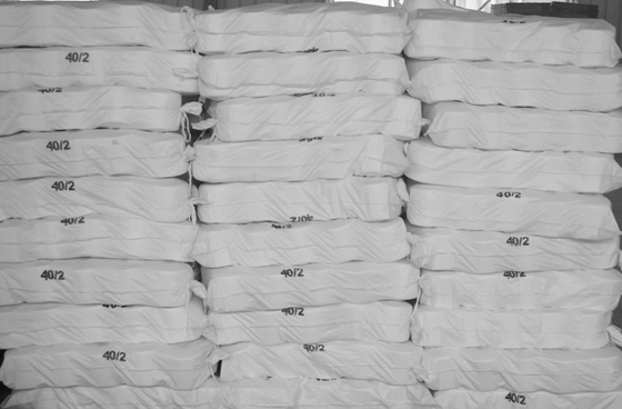 Yizheng Fiber Material 302 402 502 Spun Polyester Yarn सिलाई धागा निर्माता चीन में